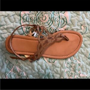 gold colored sandals!